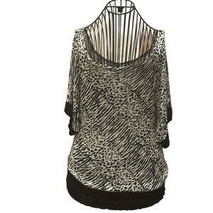 Francesca’s Collection black and white vintage y2K smocked zebra print top